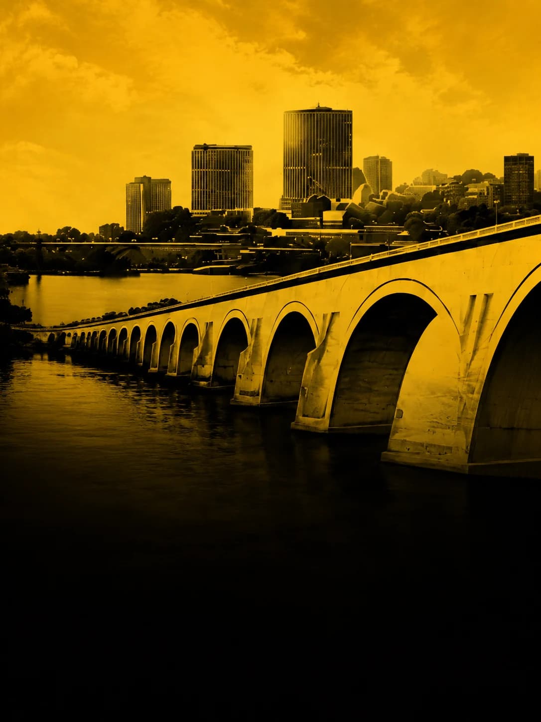 Stone Arch Bridge with the Minneapolis skyline behind it
